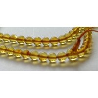 Bernsteinmala gelb klar 7 mm